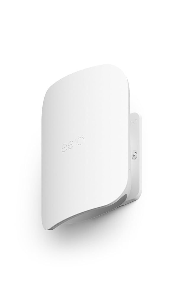 White eero access point mounted on a wall bracket