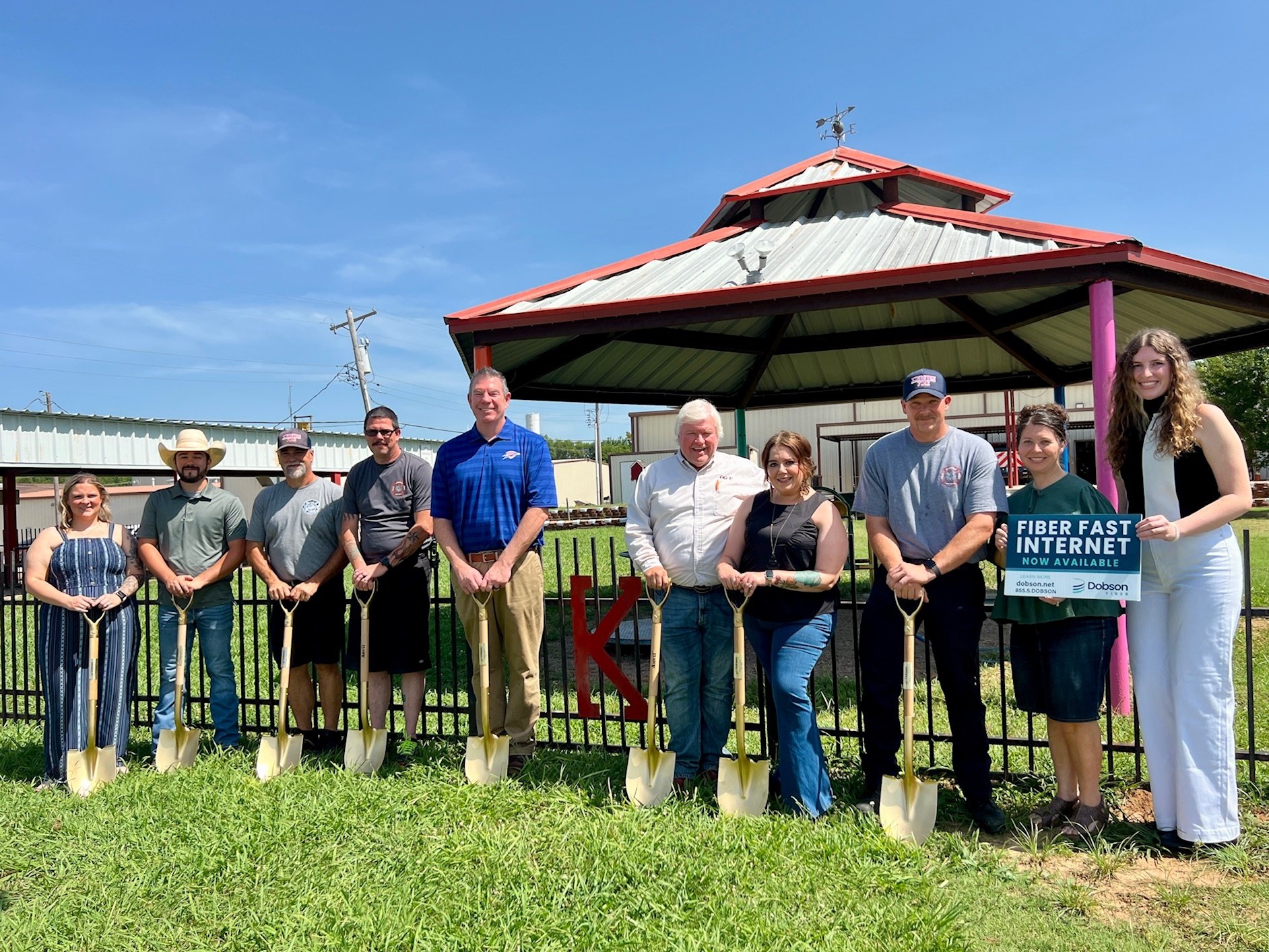City leaders in Kingston work with Dobson execs to break ground on the new fiber network. 